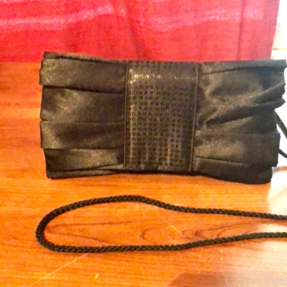 Black sequins clutch with shoulder strap